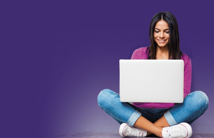 smiley women on laptop