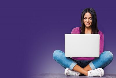 smiley women on laptop