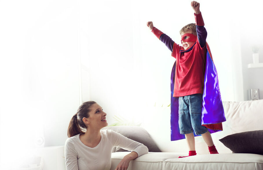 boy playing superman