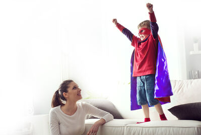 boy playing superman