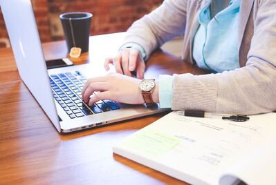 girl on laptop researching