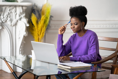 Woman on laptop at desk