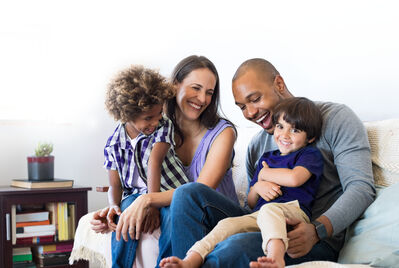 Four Person Family on Sofa