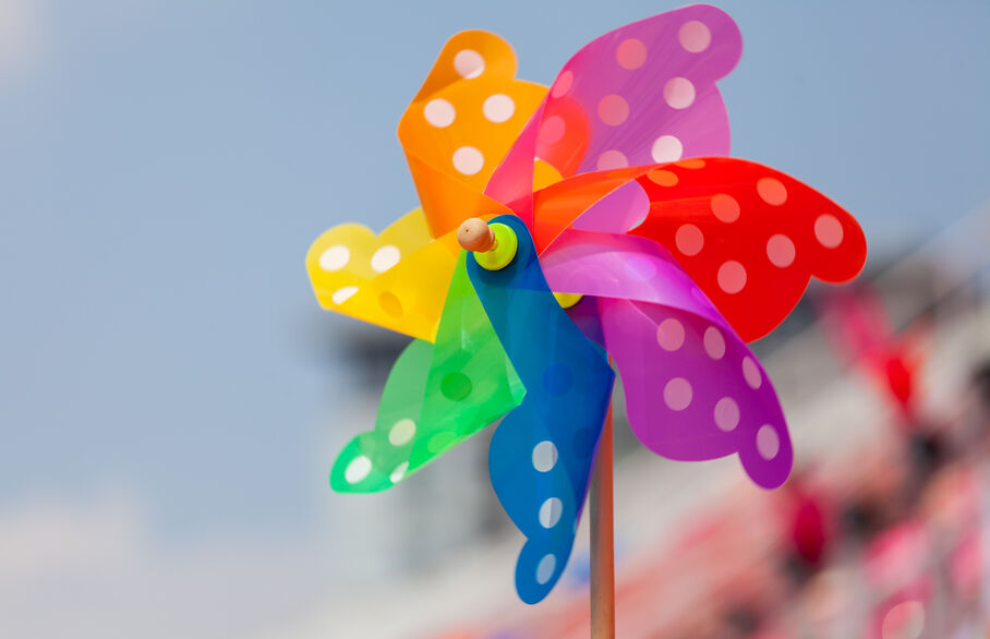 Plastic windmill brightly coloured