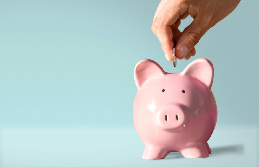 Putting money in Piggy Bank